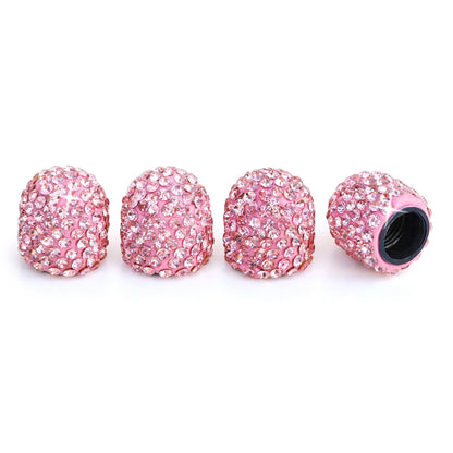 Pink rhinestone tire valve caps 4 pack close-up on white background