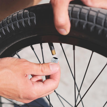 Rhinestone tire valve caps installed on bicycle tire valve stem
